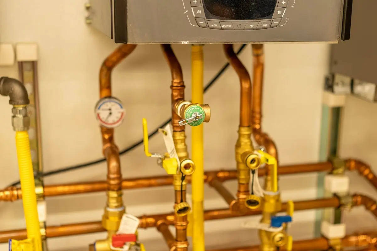 Licensed technician providing Water Heater Installation for a homeowner in Dexter